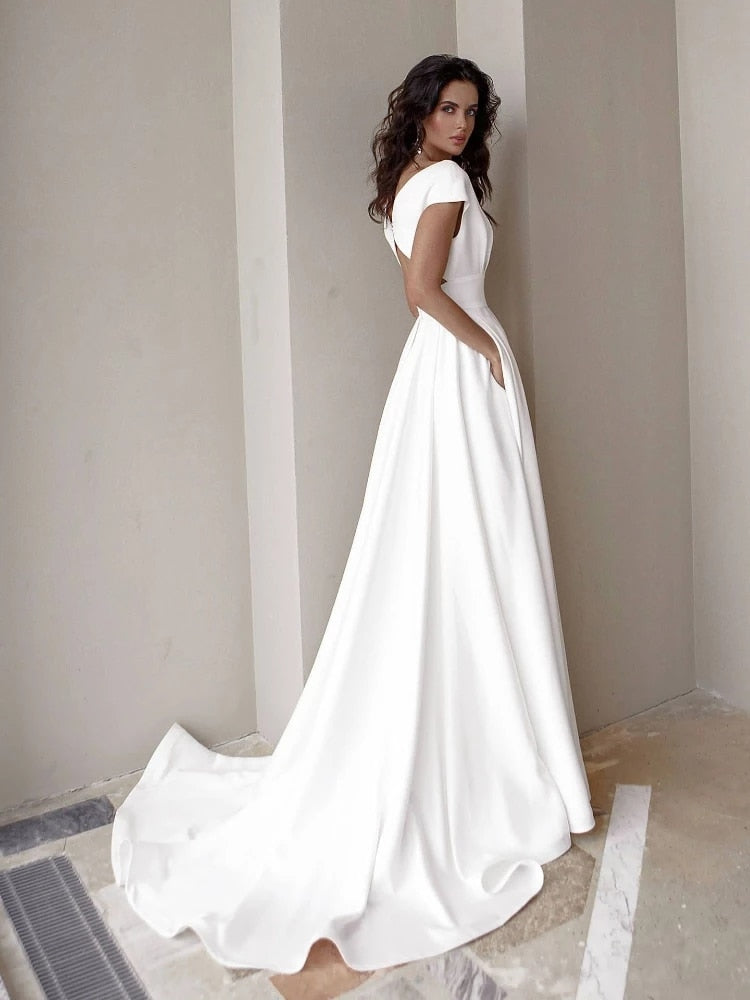 Sleeveless, floor-length V-neck formal dress with high slit. Ideal for women's special occasion parties & elegant wear.