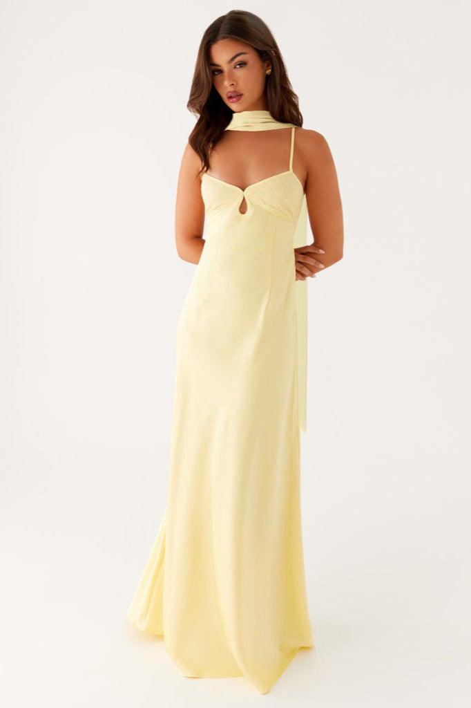 Elegant women's V-neck maxi dress with flowing silhouette & tie-back detail, perfect for formal occasions.