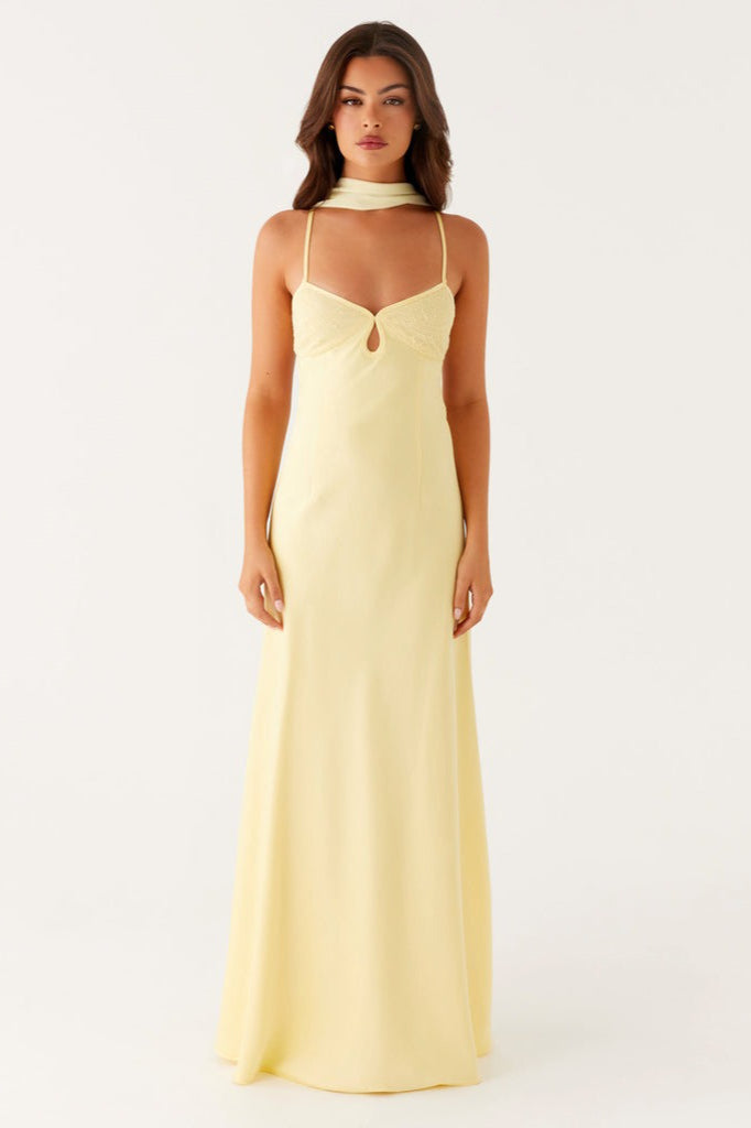 Flowing long V-neck maxi dress with a stylish tie-back for women, a chic choice for elegant fashion.
