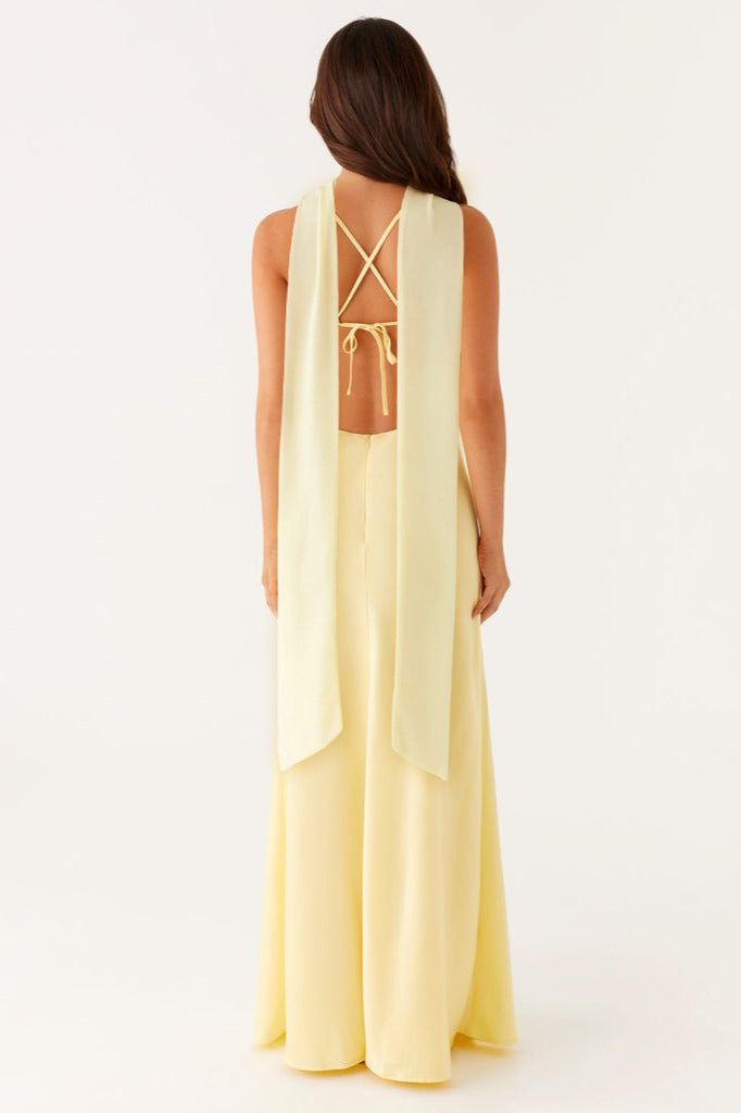 Formal women's flowing V-neck maxi dress with a graceful tie-back, combining style & comfort for events.