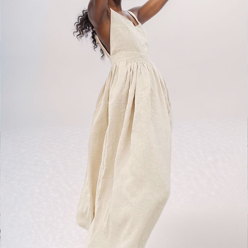 Casual yet elegant women's midi dress in a V-neck style with an alluring open back and slit