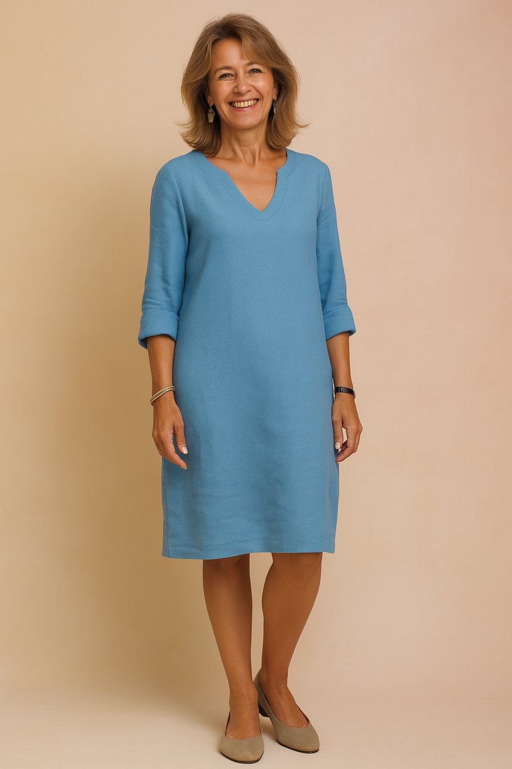 Versatile women's V-neck shift dress with relaxed fit & 3/4 sleeves. Ideal for everyday comfort.