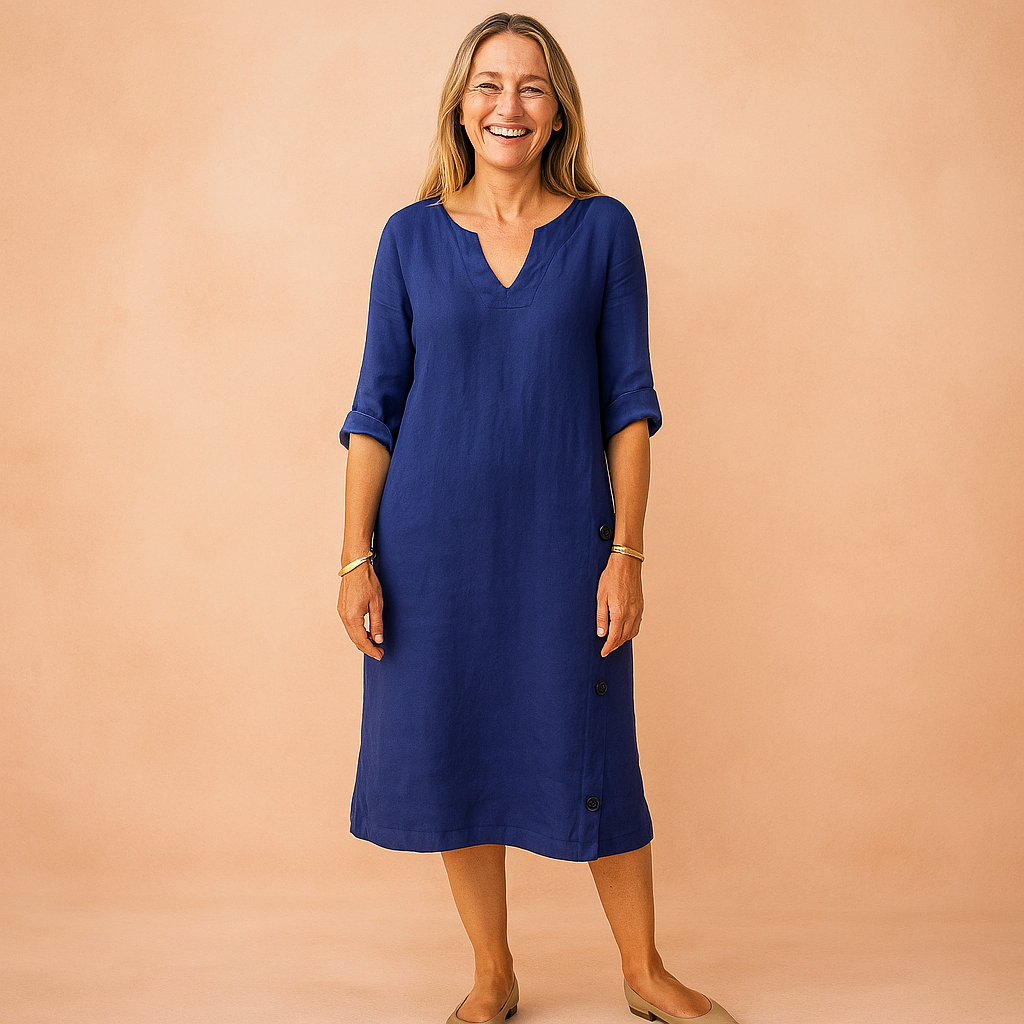 Chic women's V-neck shift dress, knee-length, with 3/4 sleeves. Great for casual comfort or professional look.
