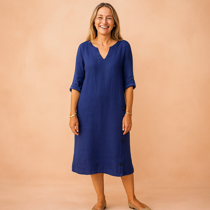 Chic women's V-neck shift dress, knee-length, with 3/4 sleeves. Great for casual comfort or professional look.