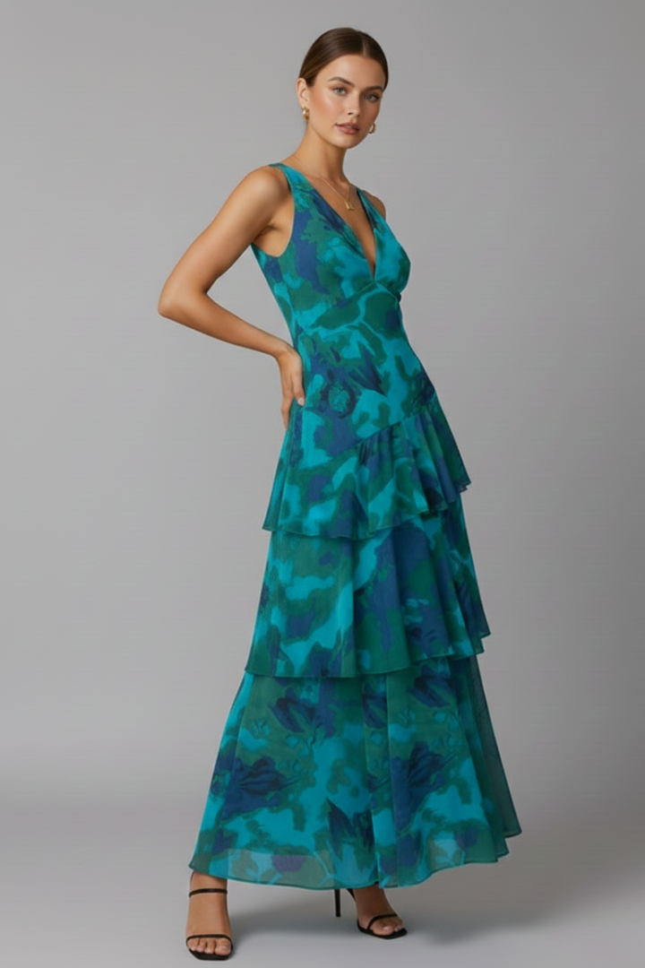 Women's summer V-neck maxi dress with multiple tiers, offering an elegant and fashionable style.