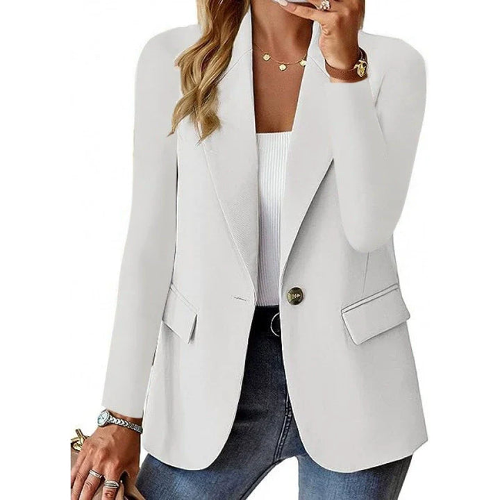 Elegant women's velvet blazer for business attire, offering a sophisticated and professional look.