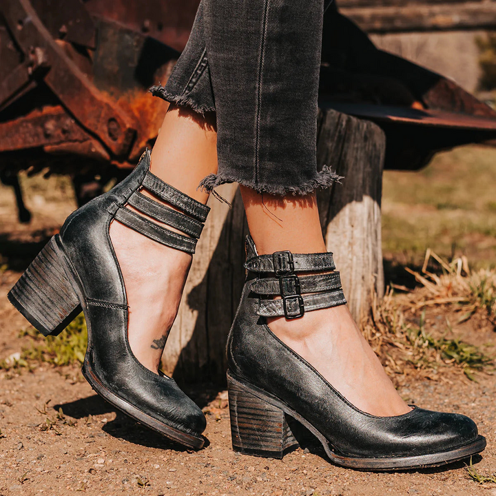Comfortable women's vintage ankle strap heels with a substantial block heel for all-day wear.