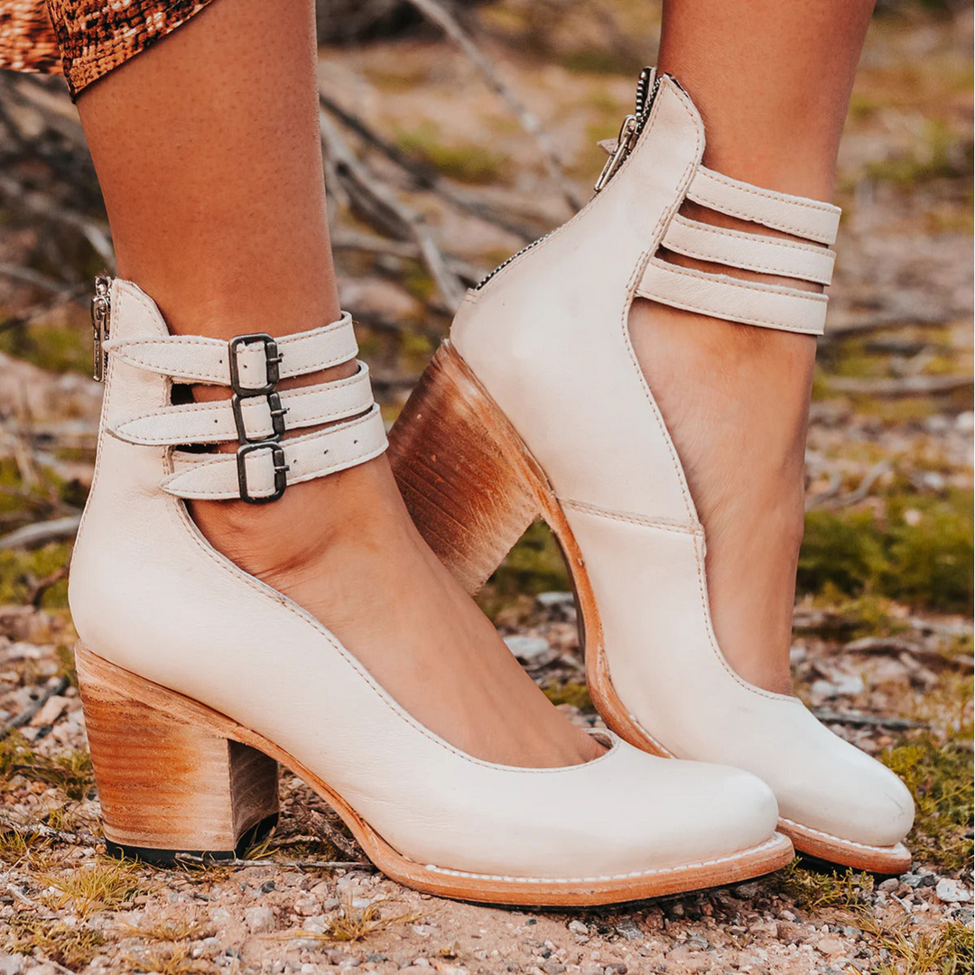 Vintage-inspired women's ankle strap heels with a comfortable block heel, ideal for party wear.