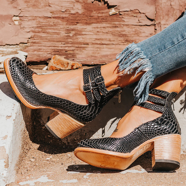 Women's elegant vintage block heel ankle strap sandals, versatile footwear for various occasions.