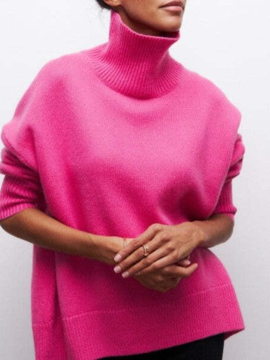 Women's elegant warm turtleneck sweater, styled for a chic yet comfortable casual winter fashion look.
