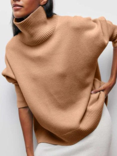 Comfortable women's long-sleeve turtleneck sweater for versatile fall and winter chic style.