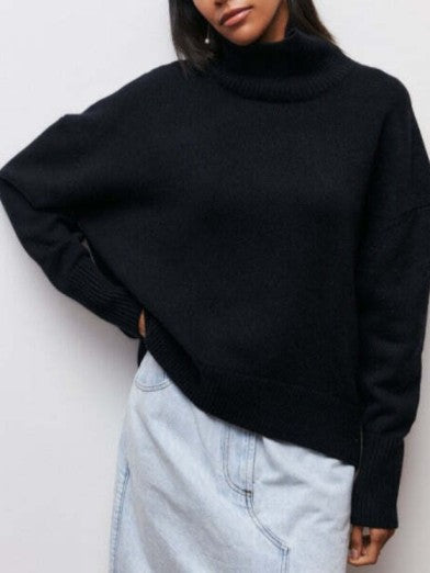 Stylish women's warm turtleneck knit sweater in a classic color, an elegant choice for winter outfits.