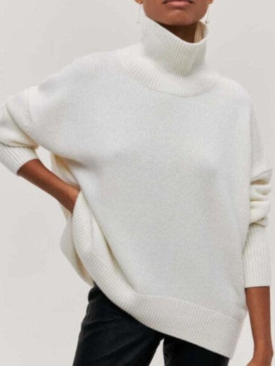 Chic women's warm turtleneck sweater, essential long-sleeve knit for elegant fall & winter fashion outfits.