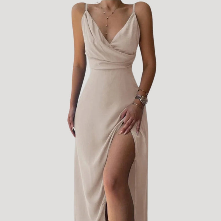 Sophisticated evening wear maxi dress for women, featuring a stylish slit and flattering silhouette.
