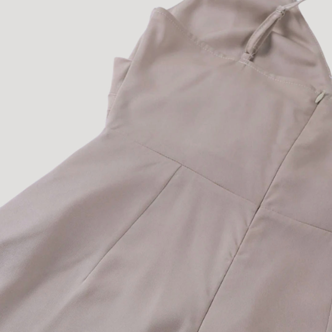Women's formal occasion dress, a long maxi style with an elegant slit, ideal for wedding guests.