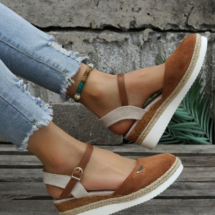 Comfortable women's wedge heel sandals, elegant design with woven straps, ideal for summer comfort.