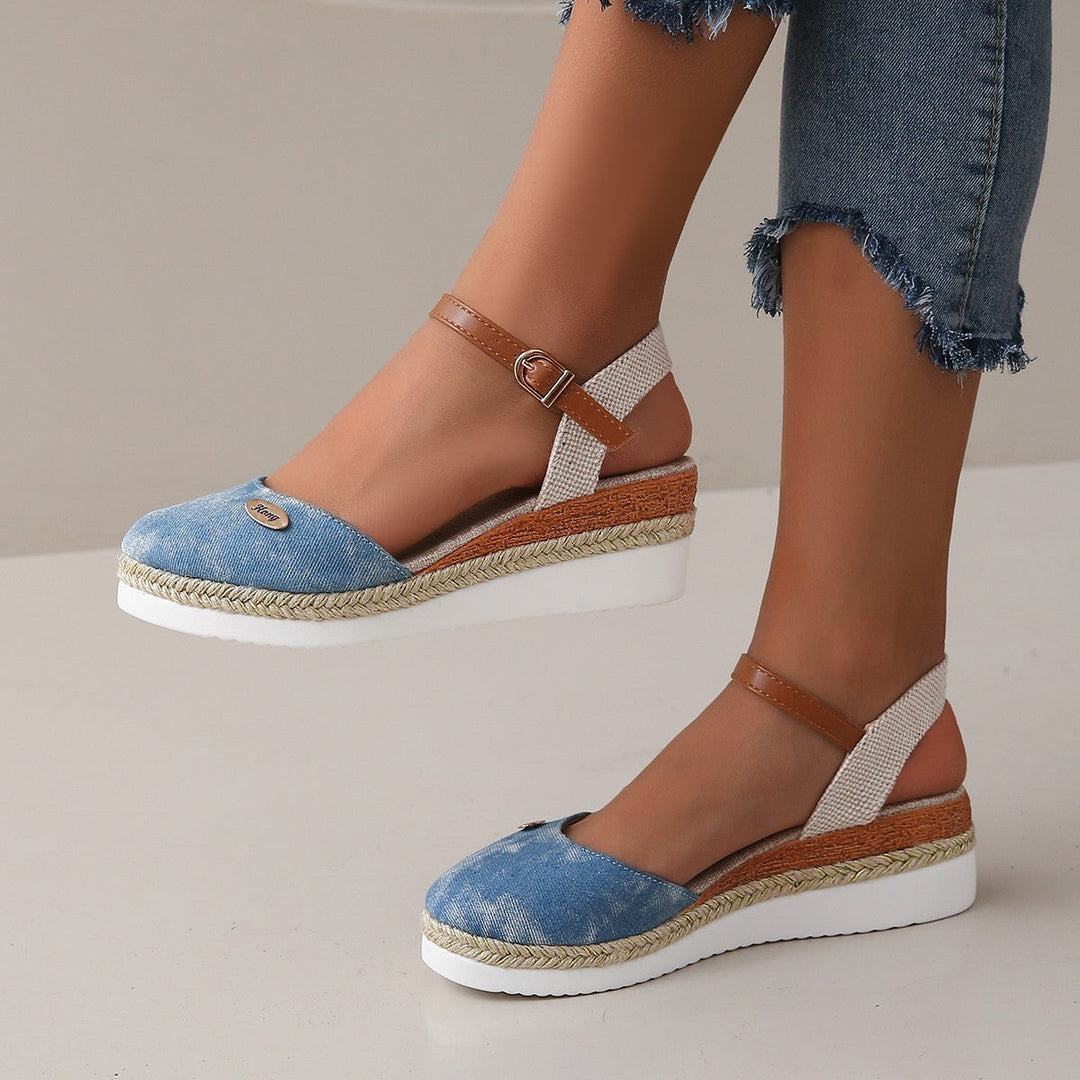 Fashionable & comfortable women's wedge sandals with elegant woven straps, perfect for summer outfits.