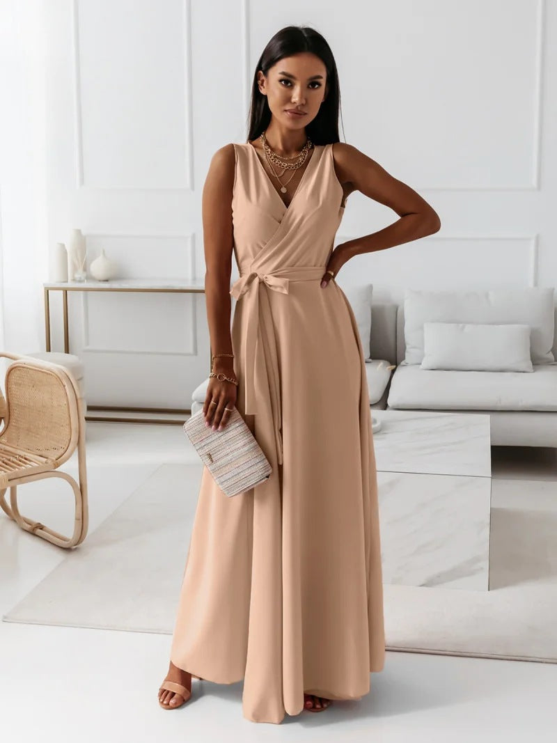 Close-up of the delicate fabric and wrap detail on a women's elegant V-neck maxi dress