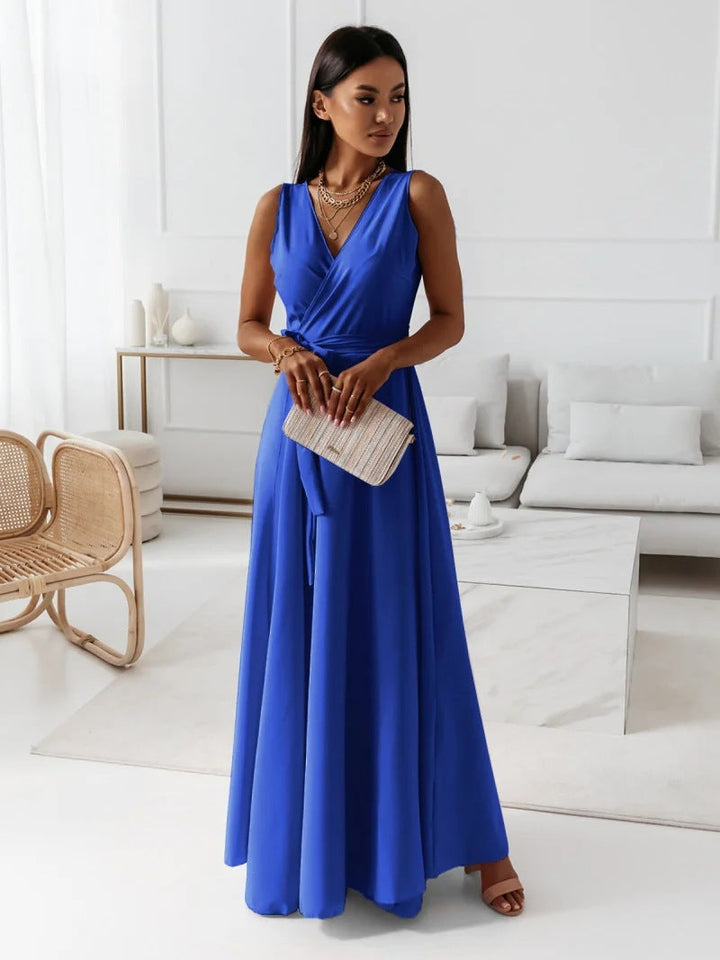 Women's sophisticated purple wrap maxi dress with short sleeves, an elegant long dress for any formal gathering