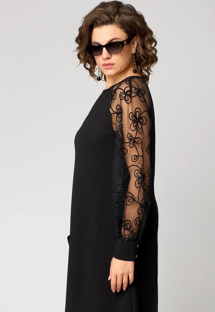 Back view of an elegant women's white lace A-line dress, perfect for occasions