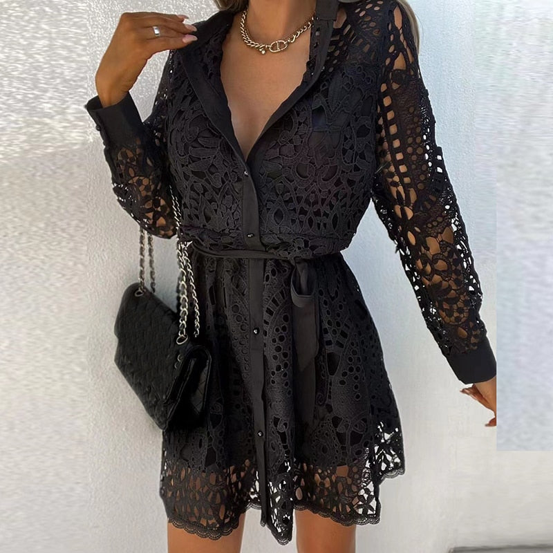 Elegant women's white lace shirt dress with long sleeves and a stylish waist tie. Perfect mini dress for parties or casual wear.