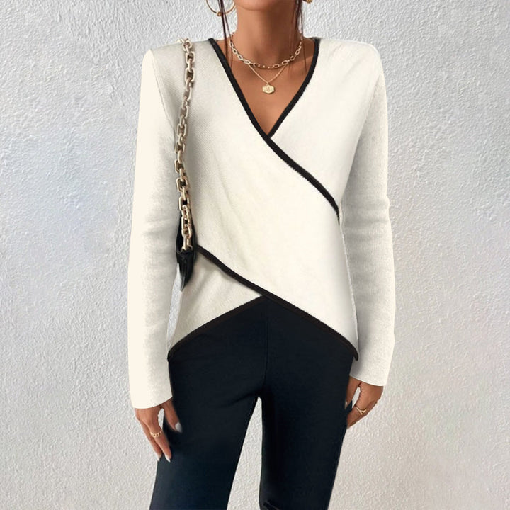Elegant women's white long sleeve wrap V-neck sweater, perfect for winter knitwear fashion.