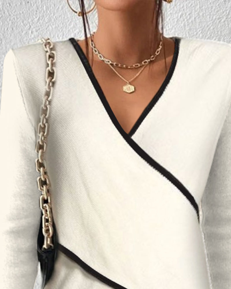 Comfortable casual women's winter wrap V-neck sweater in white knit, ideal for cold weather.