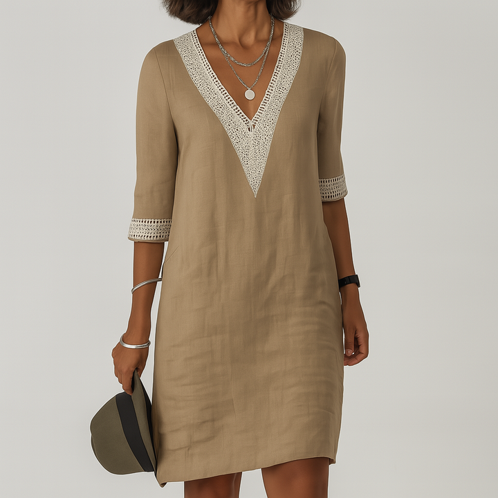 Elegant women's white midi summer dress, sleeveless & relaxed fit for comfortable warm weather & vacation wear.