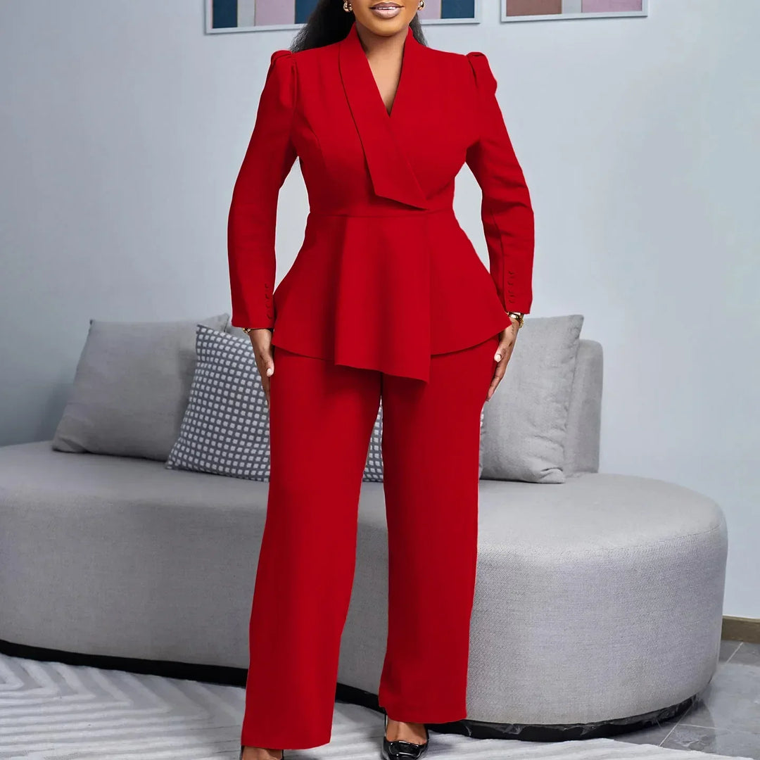 Chic women's formal suit set featuring a fitted long blazer with peplum detail and classic trousers for business.
