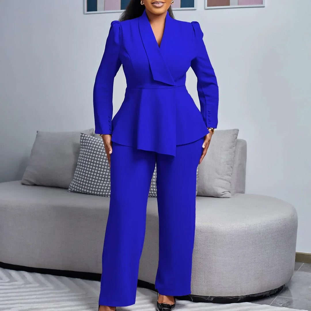 Professional women's tailored suit ensemble, including a stylish long blazer and comfortable trousers, ideal for formal wear.