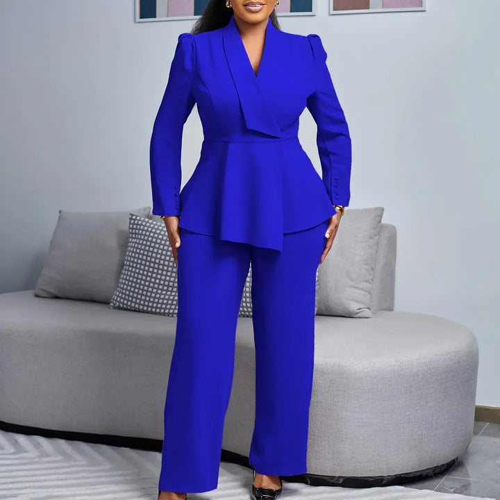Professional women's tailored suit ensemble, including a stylish long blazer and comfortable trousers, ideal for formal wear.