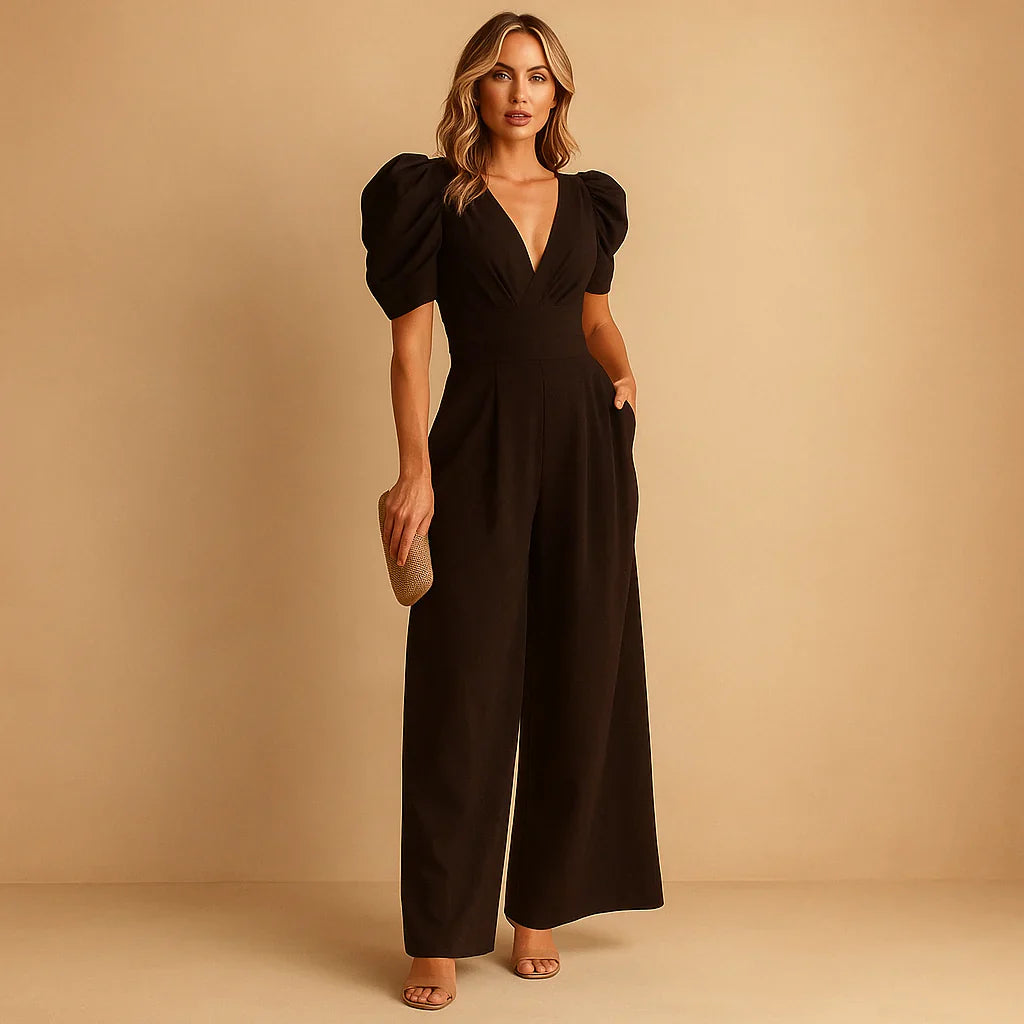 Women's formal black long sleeve jumpsuit featuring elegant puff shoulders and tailored fit.