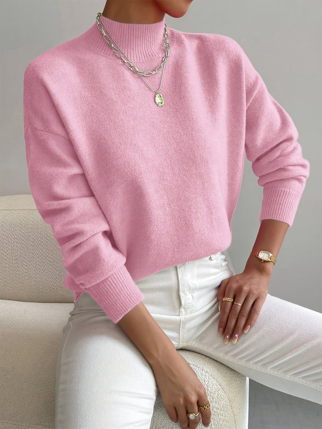 Women's long sleeve turtleneck sweater in a soft beige knit, a cozy and chic winter fashion staple