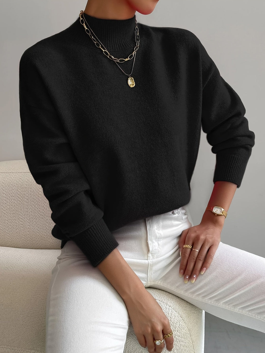 Detail of the knit pattern on an elegant women's turtleneck sweater, ideal for winter comfort
