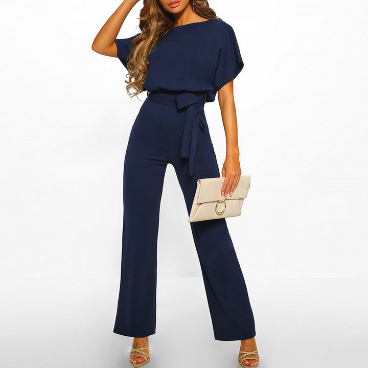 Modern chic women's wide leg jumpsuit with elegant flutter sleeves, great for formal events & stylish business wear.