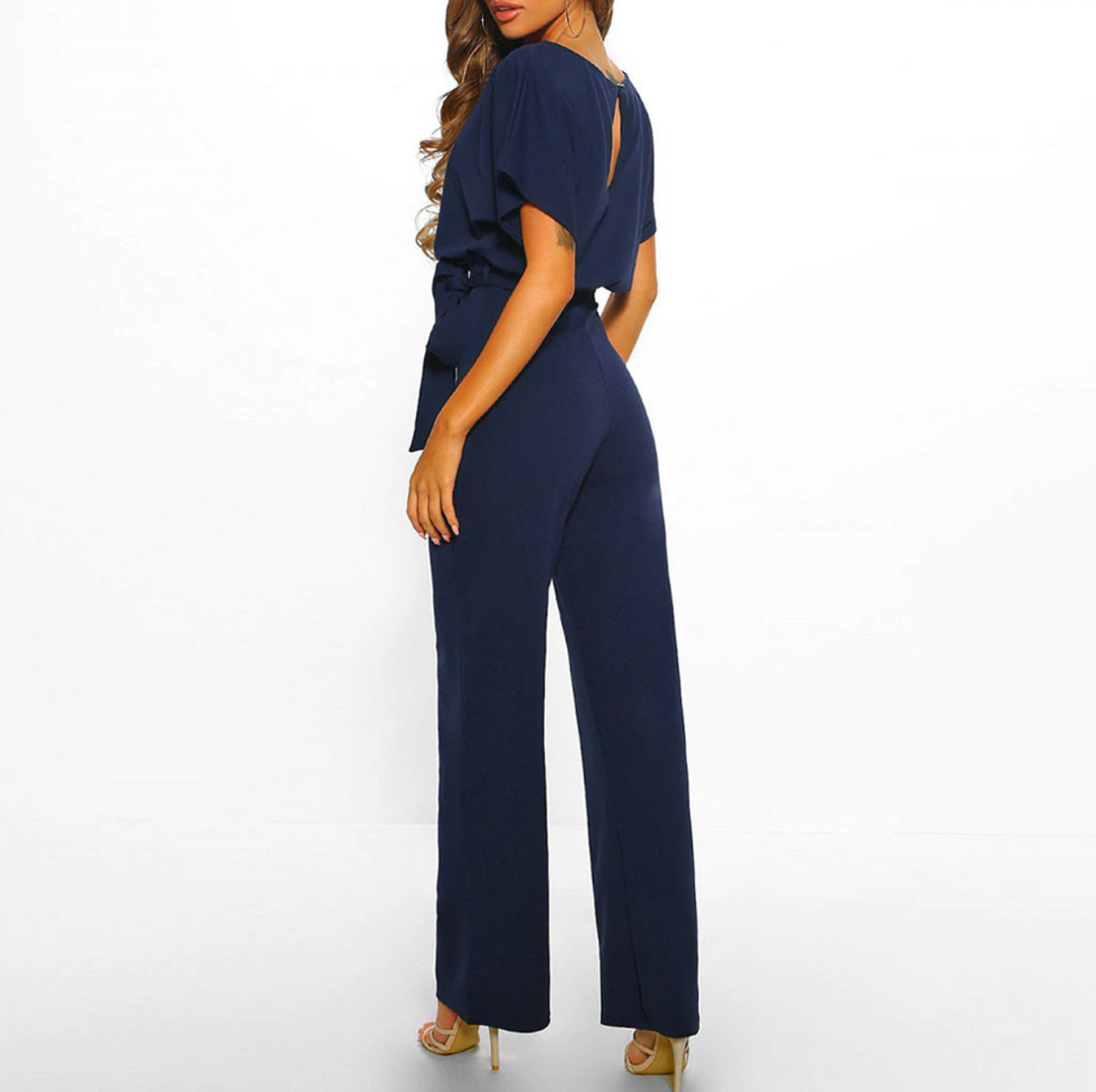Stylish women's wide leg jumpsuit with elegant flutter sleeves. A comfortable & chic option for any occasion.