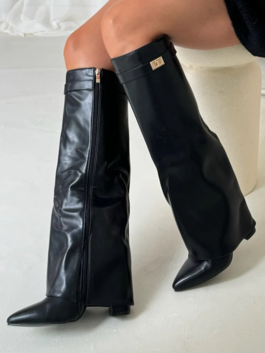 Stylish women's wide leg leather heeled boots, perfect for winter outfits, with a distinctive folded top.