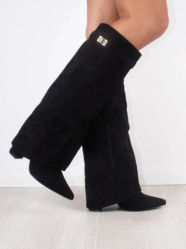 Sophisticated women's wide leg leather boots with a fashionable folded shaft and practical heel.