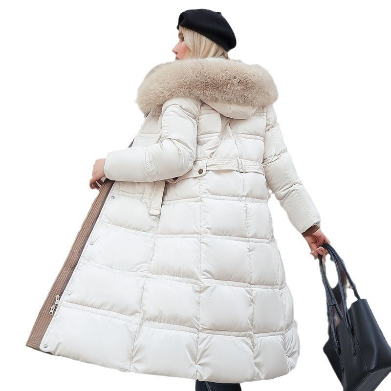 Women's outerwear: chic polyester blend winter coat with a versatile removable hood.