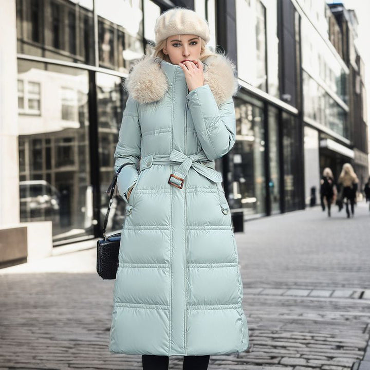 Stylish women's winter coat with removable hood, polyester blend, offering warmth and elegance.
