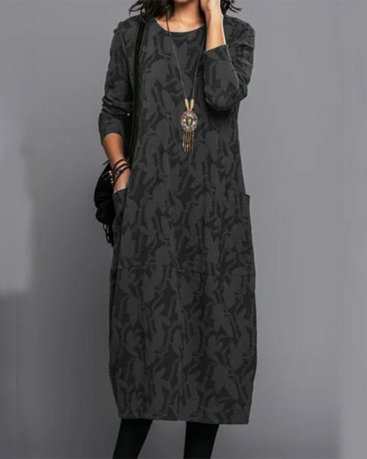 Full-length maxi dress for women with long sleeves and pockets, a versatile and elegant winter staple.