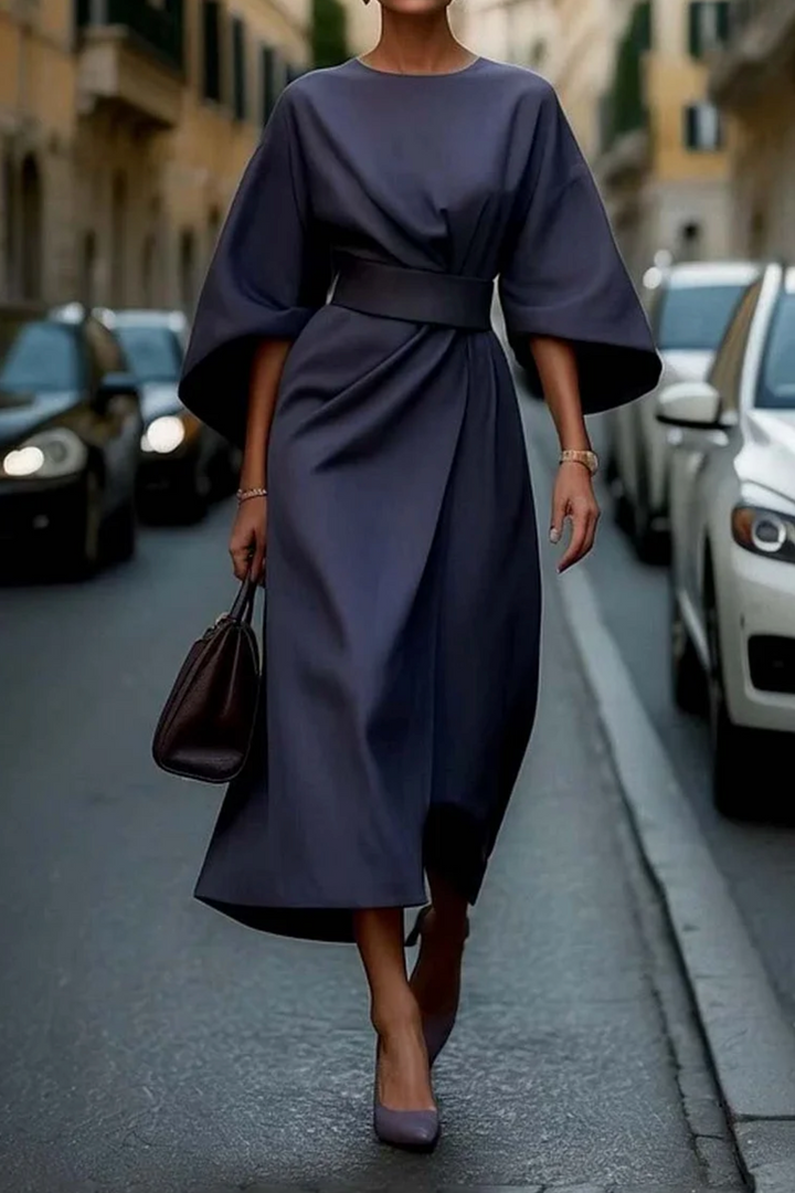 Comfortable long sleeve midi dress for women, featuring chic lantern sleeves and a flattering silhouette.