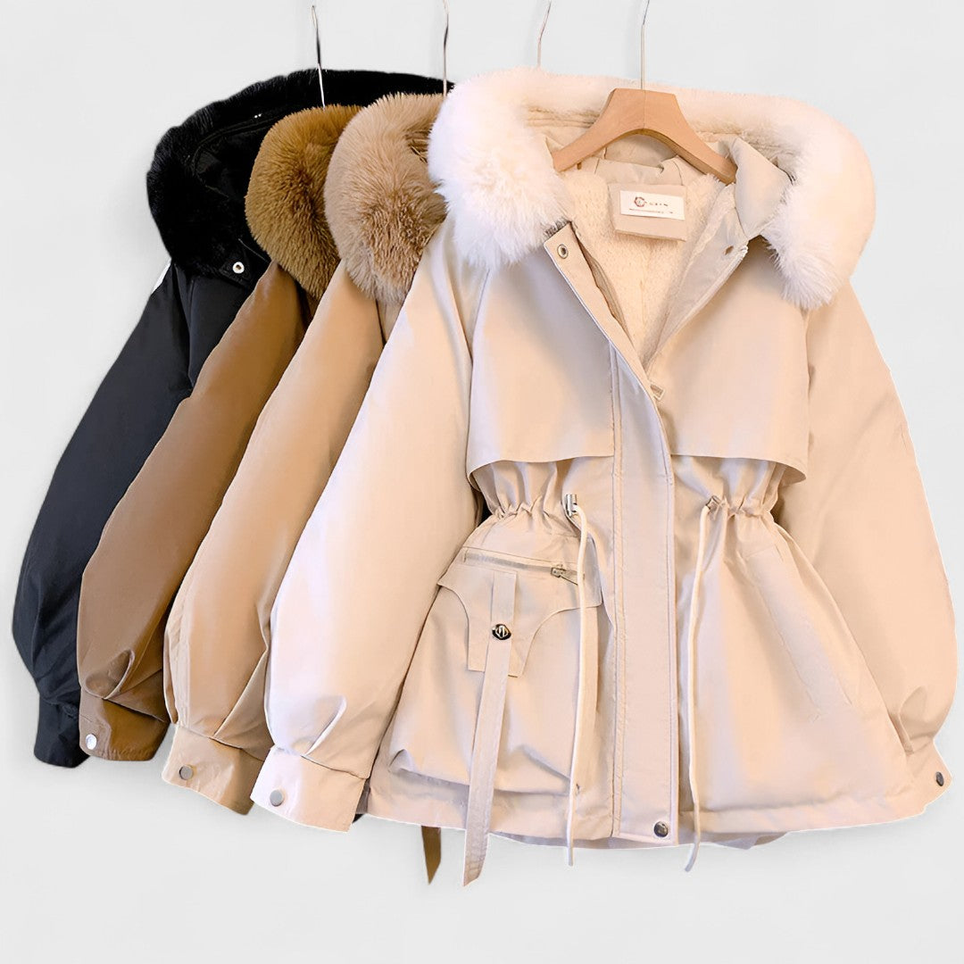 Premium women's winter parka jacket, featuring a sophisticated faux fur hood, offering elegance and warmth in cold weather.