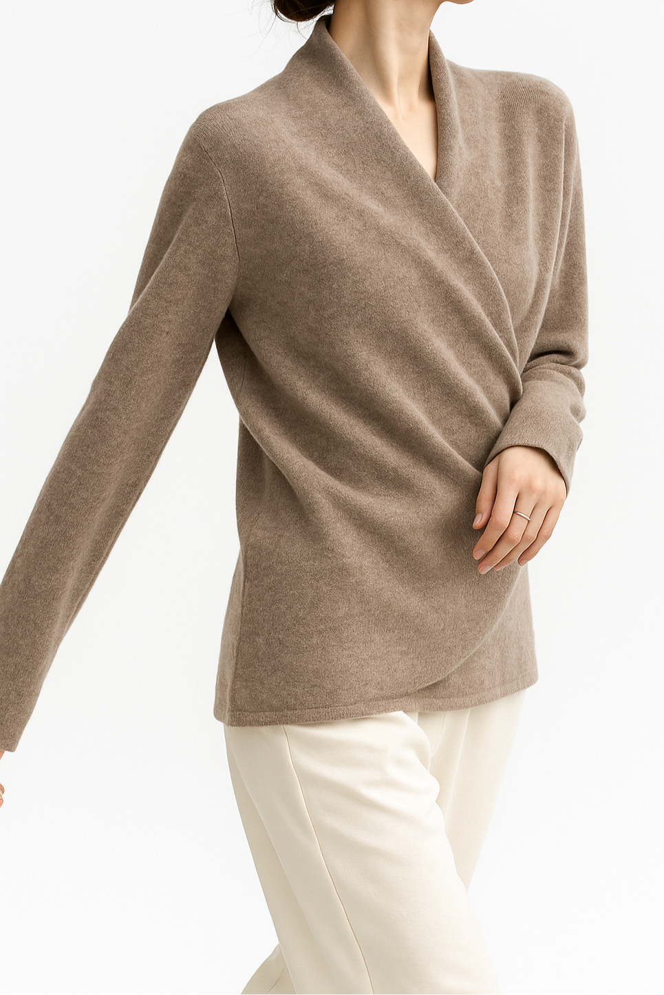 Zoomed-in texture of a women's casual knit sweater, V-neck wrap design for winter comfort.