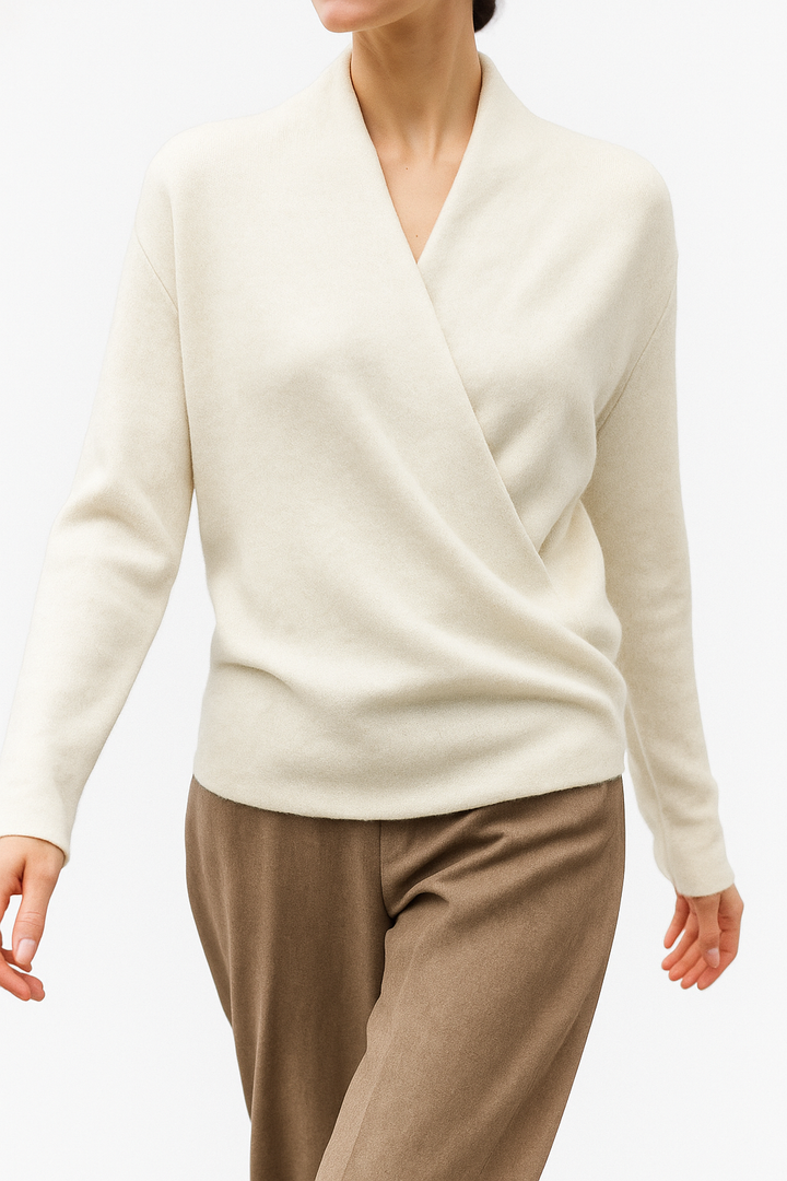 Women's cream V-neck knit sweater with a flattering wrap front, ideal for winter.