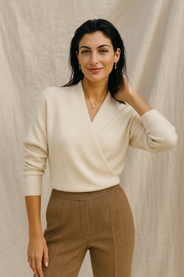 Back view of a women's cozy winter wrap V-neck knit sweater, showing hemline.