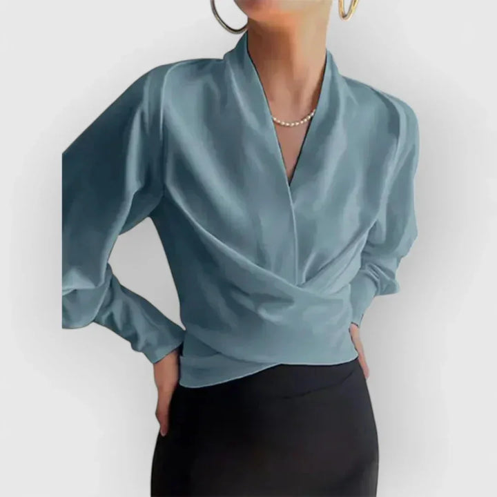 Stylish wrap blouse for women, featuring an elegant design suitable for professional office attire.
