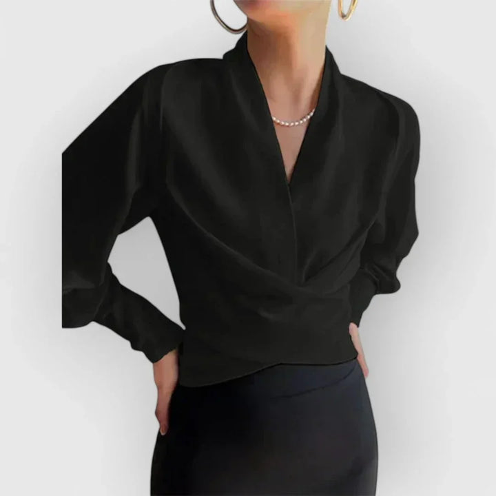 Chic women's wrap top. A versatile blouse for office or casual settings, enhancing your everyday style.