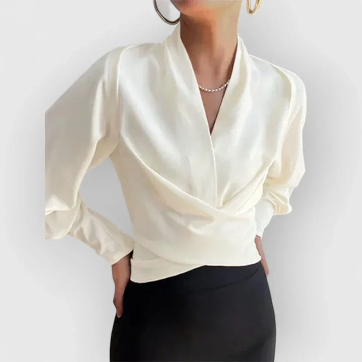 Fashionable women's wrap blouse, elegant and comfortable for both office and casual occasions.
