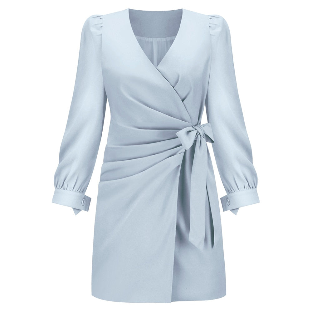 Comfortable & elegant women's wrap mini dress. Features long sleeves, a chic V-neck, and a flattering waist tie.